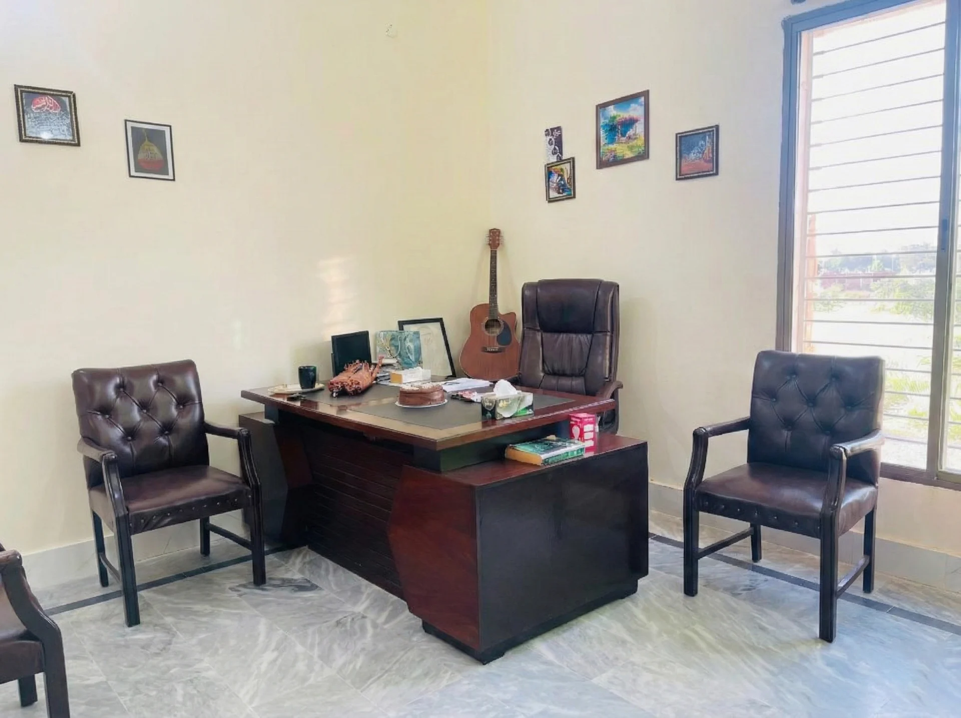Professional admission and consultation office at Amaim Brain Care providing psychiatric and psychological services under Dr. Ahsan Tariq Dogar
